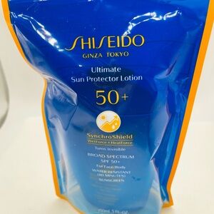 Shiseido Ultimate Sun Protector Lotion SPF 50+ - Blue and Orange